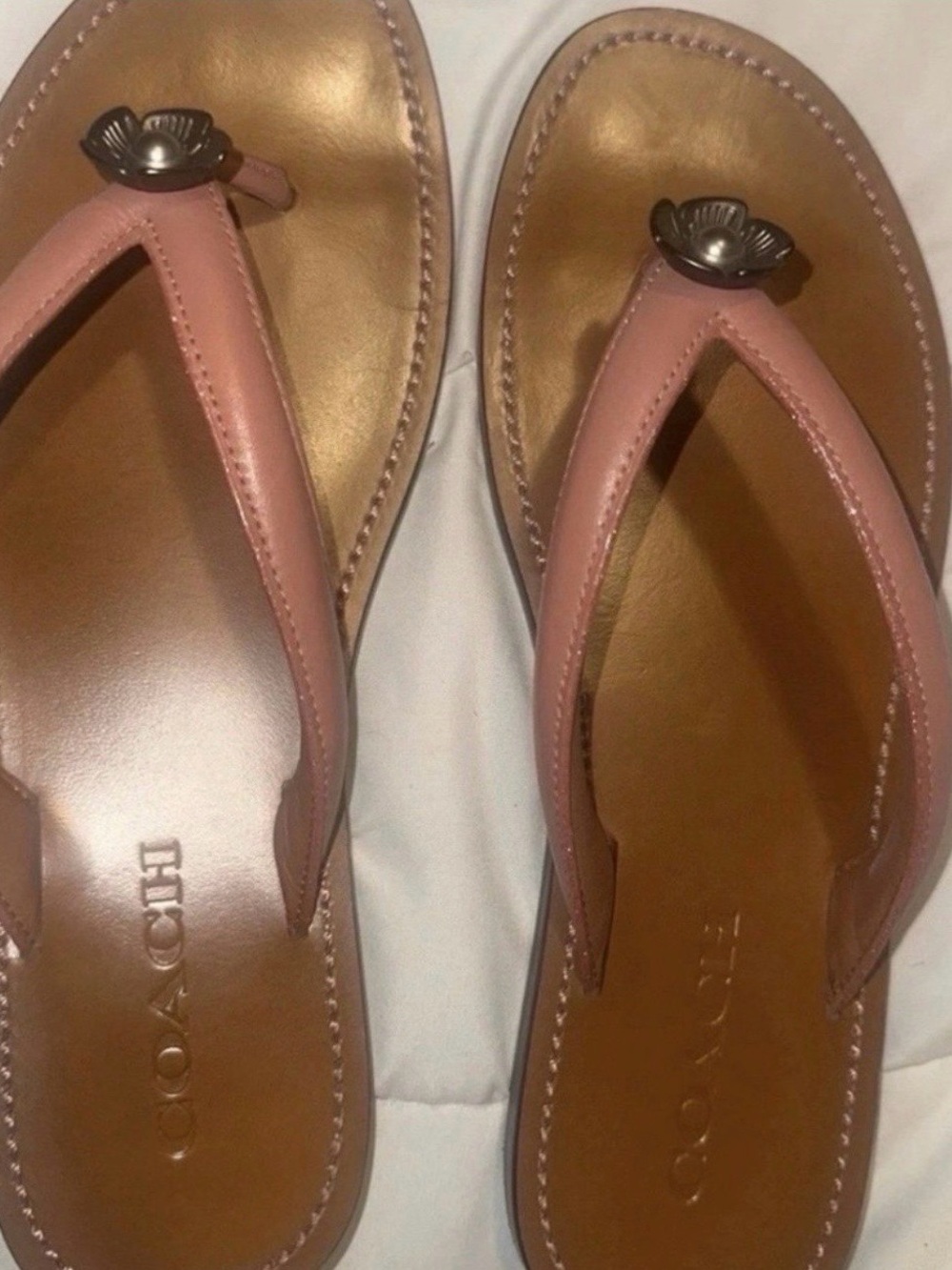 COACH Pink Leather Thong Sandals with Floral Metal Accent